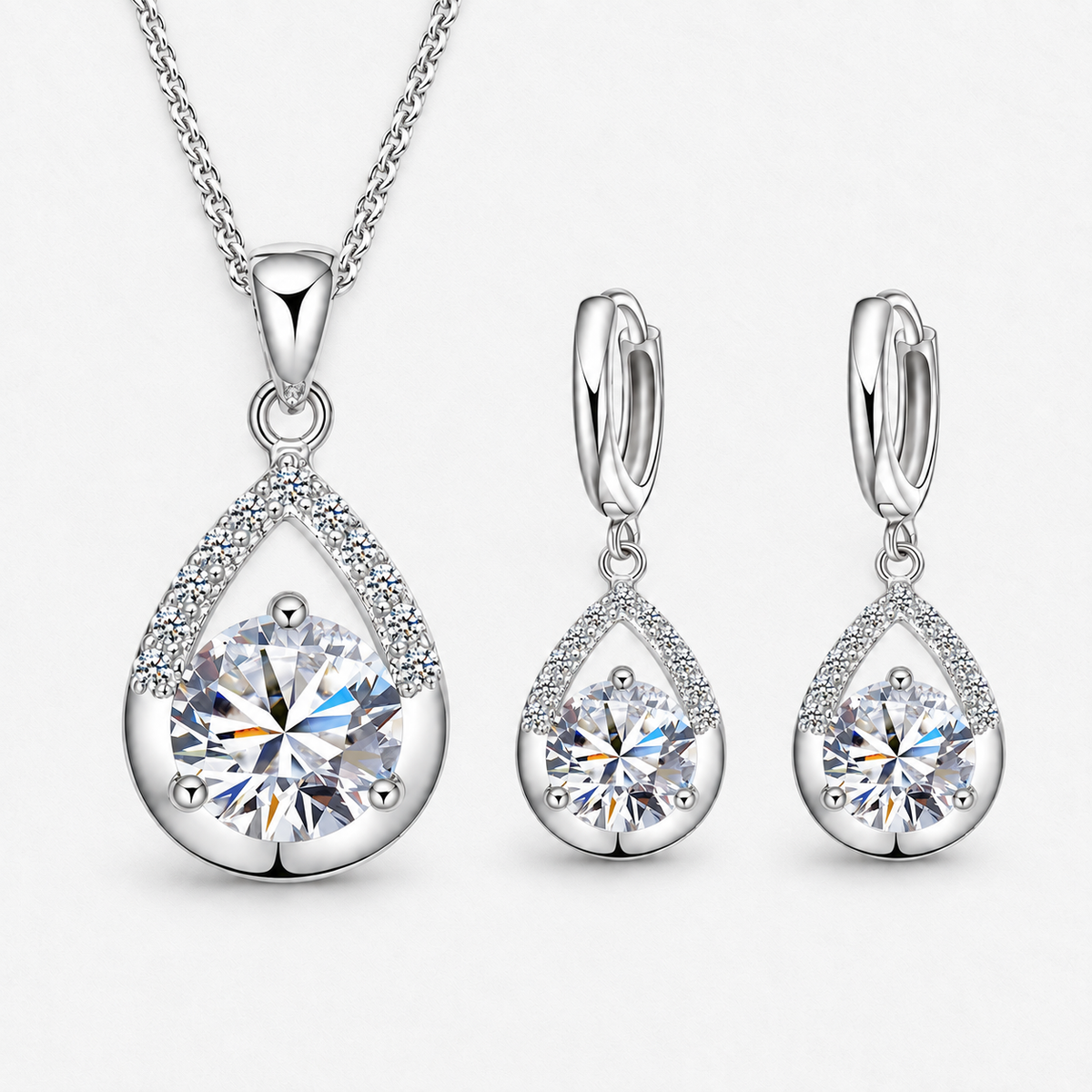Silver-Tone Teardrop Crystal Necklace & Earring Set in Clear, product view on a white background - Vessaly