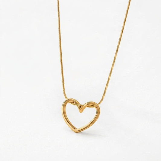 Solstice heart necklace in polished gold finish