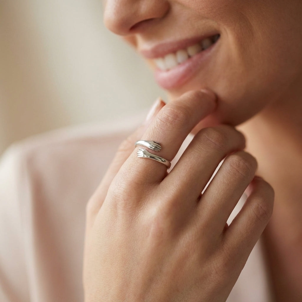 Gold ring with hugging arms design