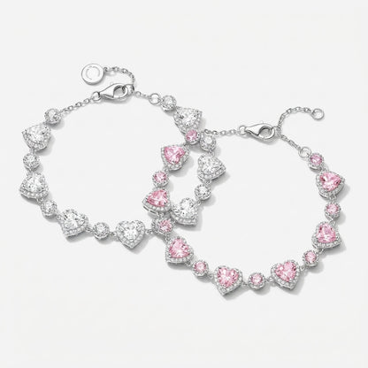 Pink heart tennis bracelet on neutral background