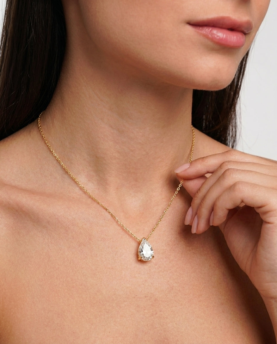 Close-up of pear-cut moissanite solitaire – Vessaly