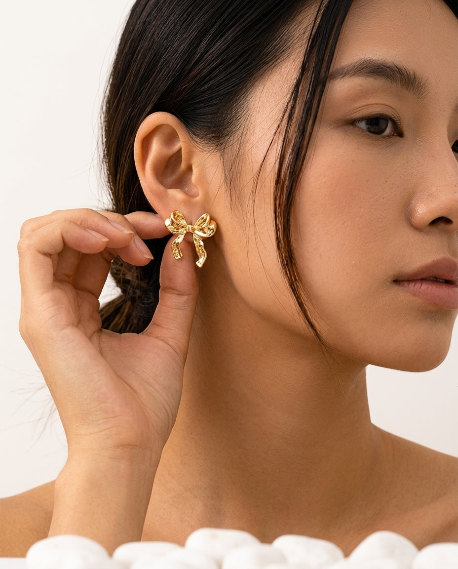 Bow earrings worn on the ear – Vessaly