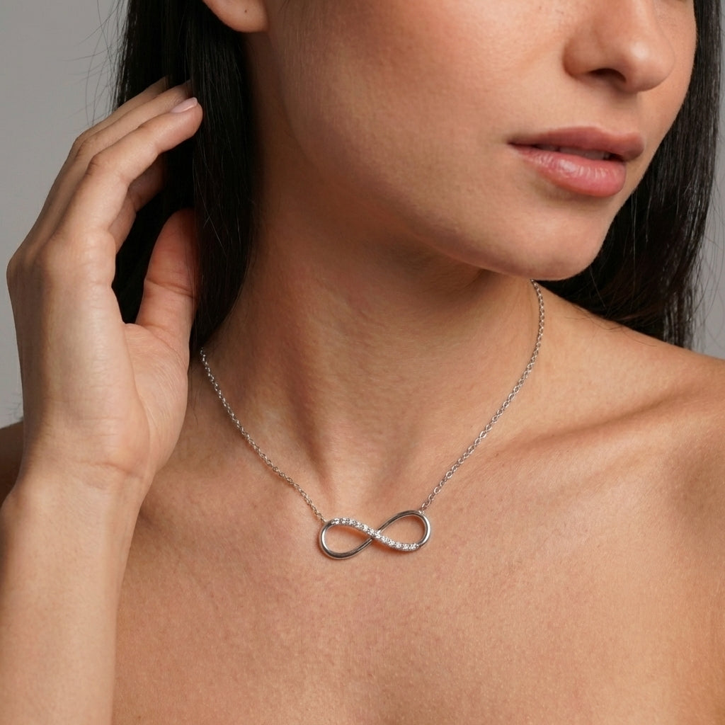 Infinity love necklace styled on neckline – Vessaly