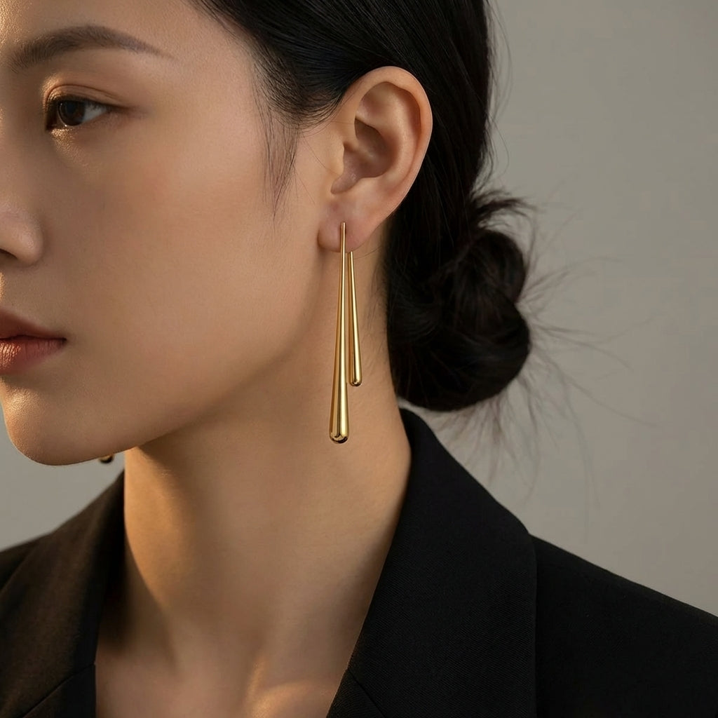 Asymmetric drop earrings worn on the ear – Vessaly
