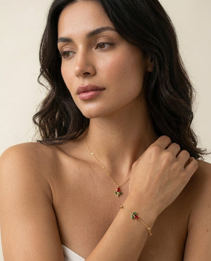 Gold tulip pendant necklace styled on a model's neckline