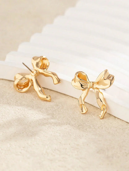 Ribbon bow earrings in gold – Vessaly