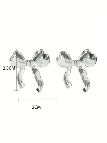 Ribbon bow earrings detail shot, romantic design