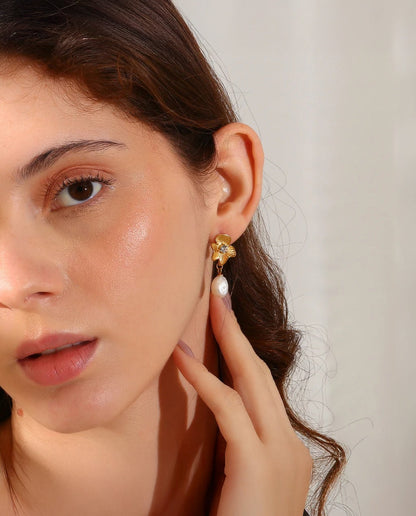 Gold magnolia floral drop earrings, romantic design
