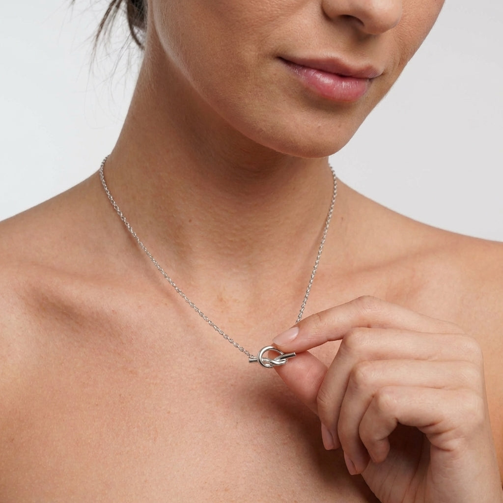 Love knot necklace side angle – Vessaly