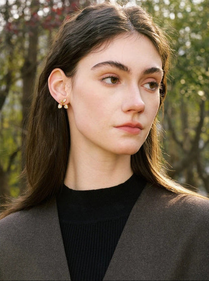 Cherry stud earrings worn on the ear – Vessaly
