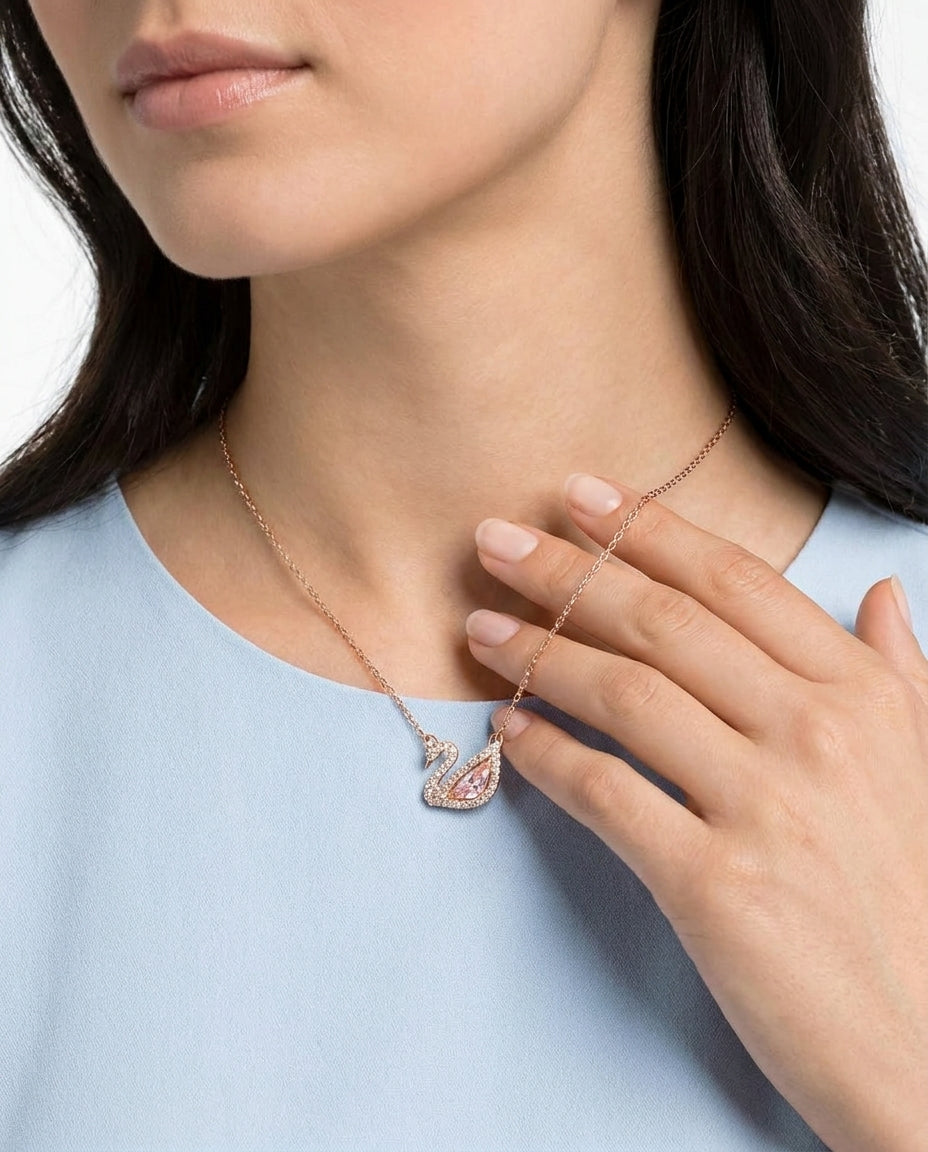 Rose gold swan necklace side angle – Vessaly