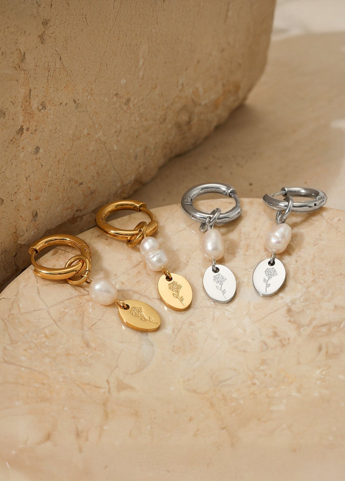 Pearl vine earrings on neutral background