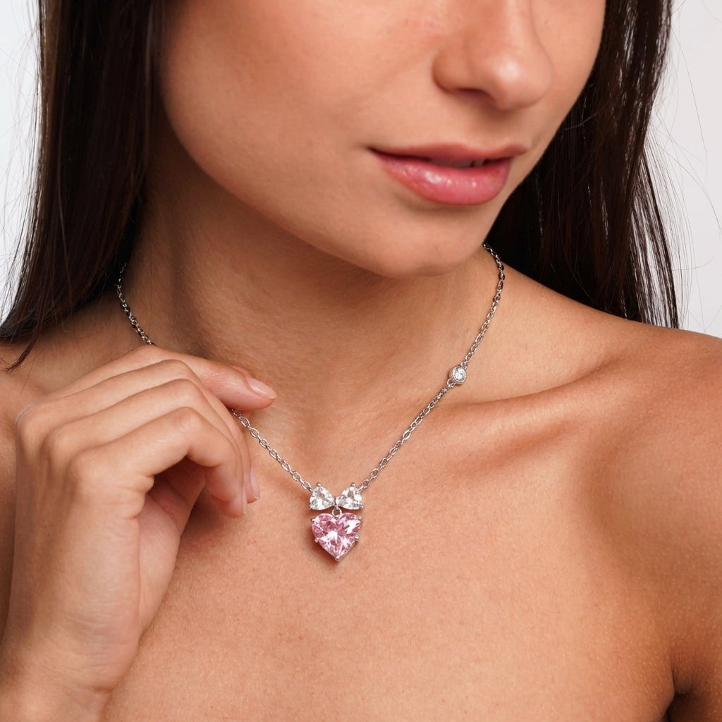 Bow heart necklace styled on neckline – Vessaly