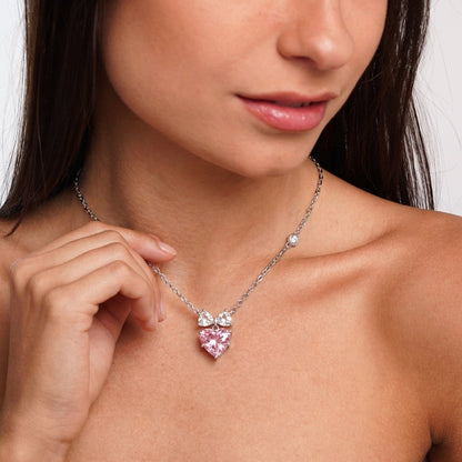 Bow heart necklace styled on neckline – Vessaly