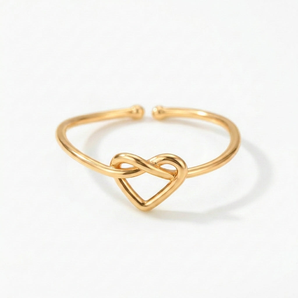 Love knot adjustable ring in gold – Vessaly