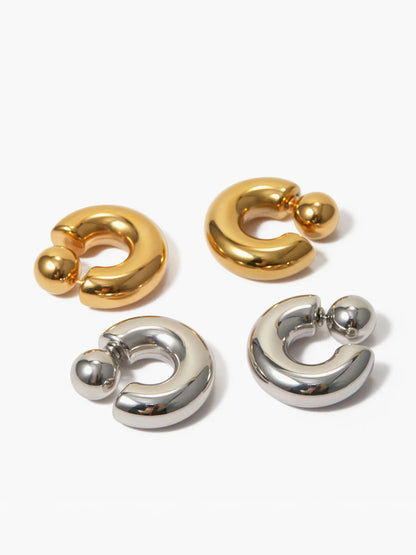 Chunky C-shaped hoop earrings — side angle, polished finish