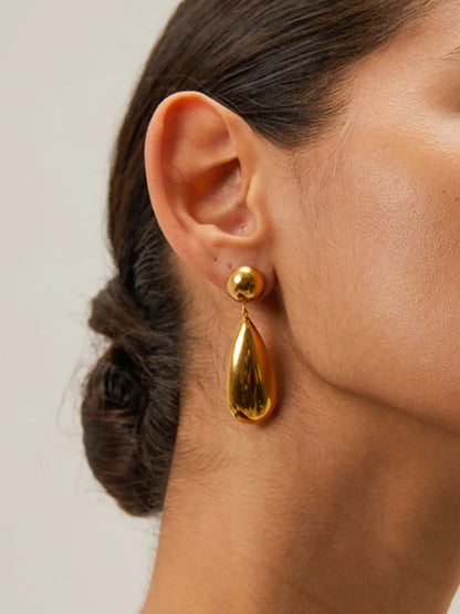 Gold teardrop earrings with polished finish