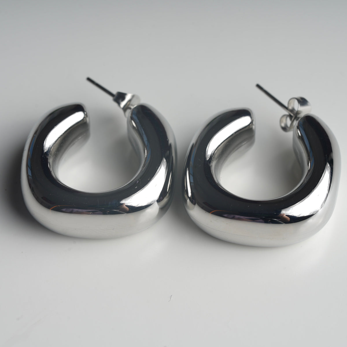 Medium silver hoop earrings detail shot