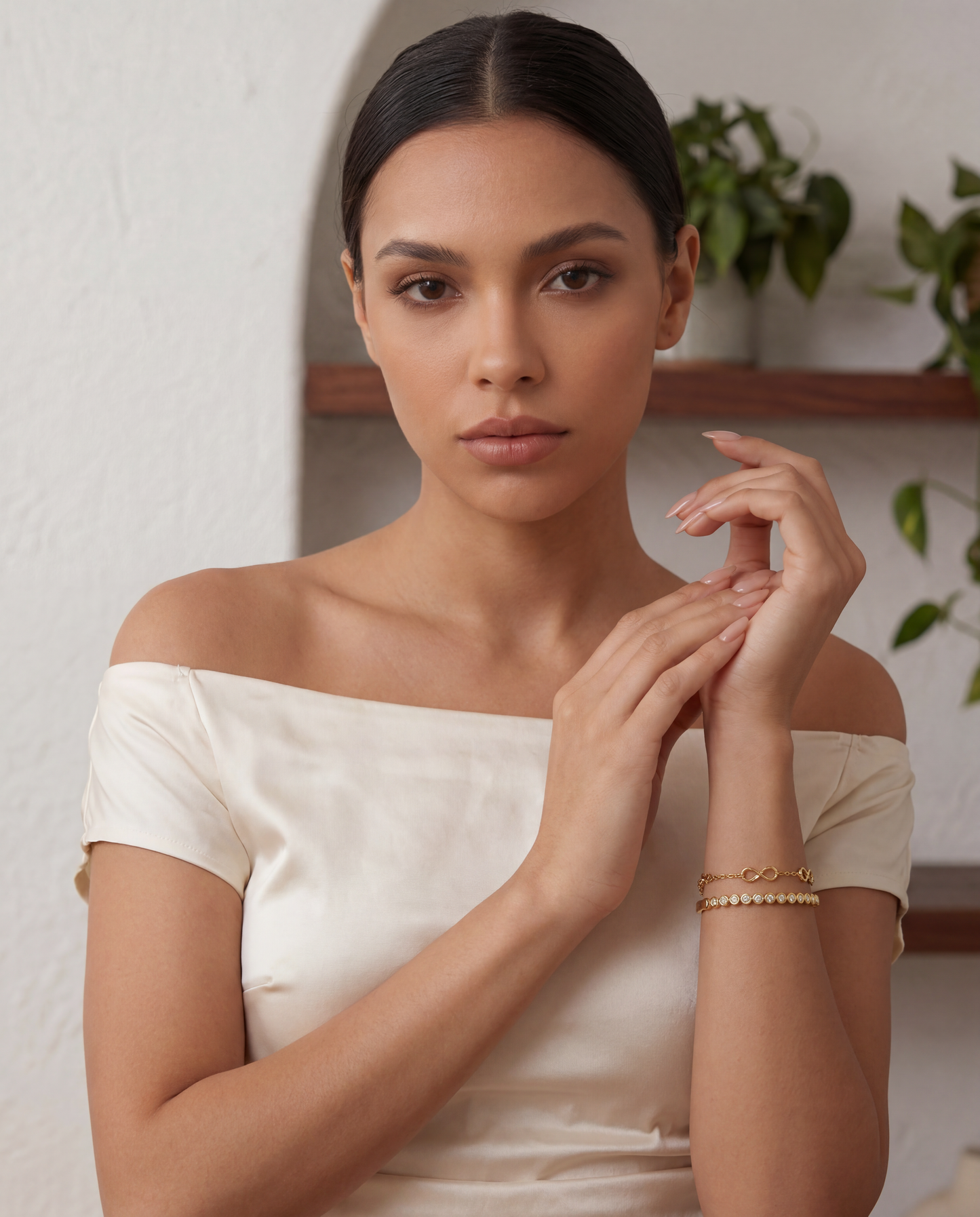 Close-up of 14K gold infinity loop detail