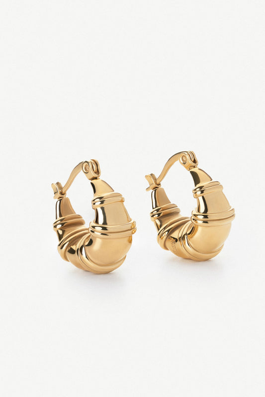 Chunky teardrop ringed gold drop earrings by Ravyena
