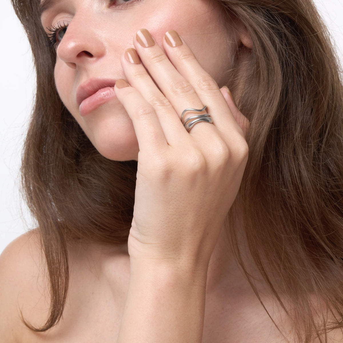 Tyra ring on neutral background, polished finish