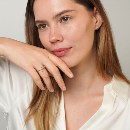 Silver feather heart ring worn on the finger – Vessaly