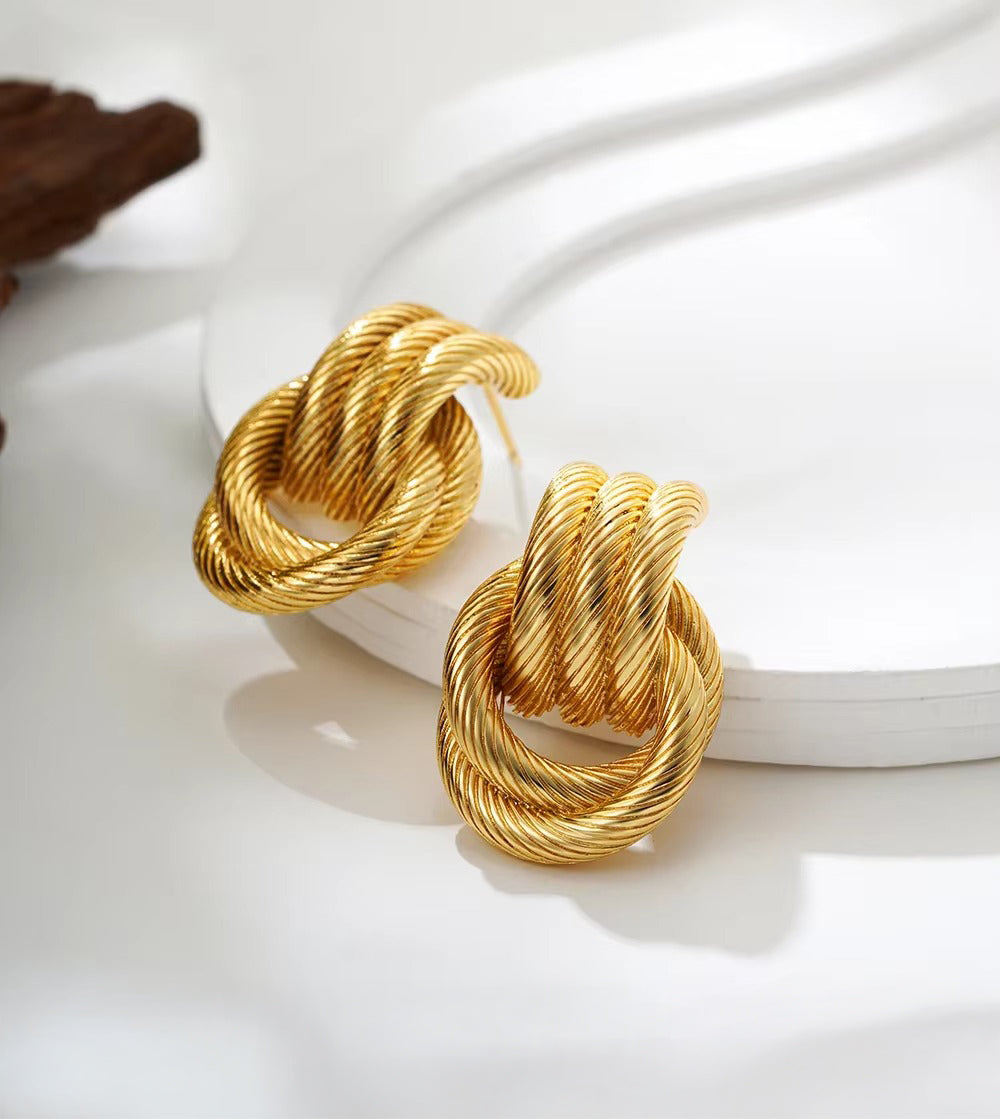 Gold knot earrings — refined modern design