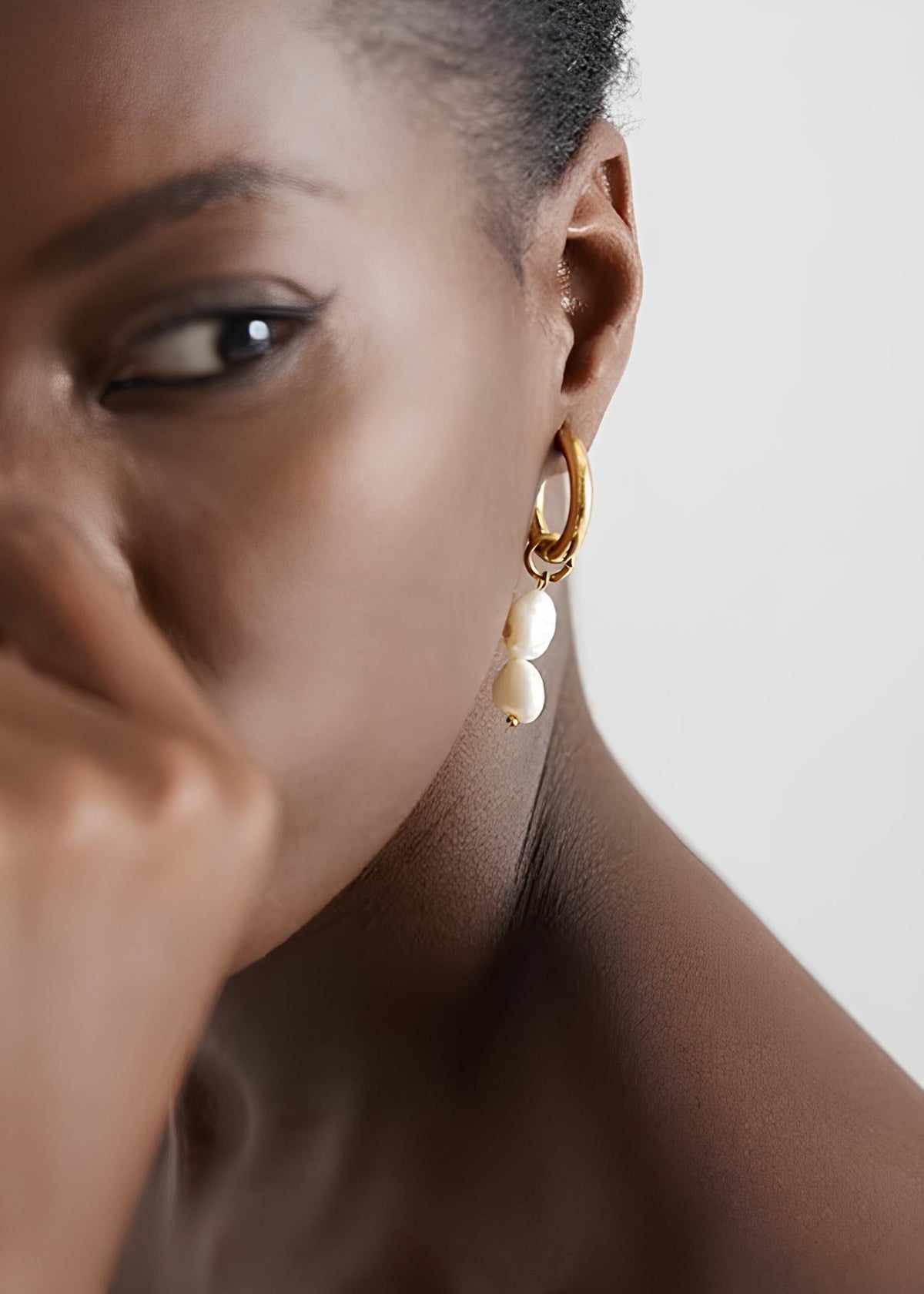 Natural pearl drop on gold hoop detail – Vessaly