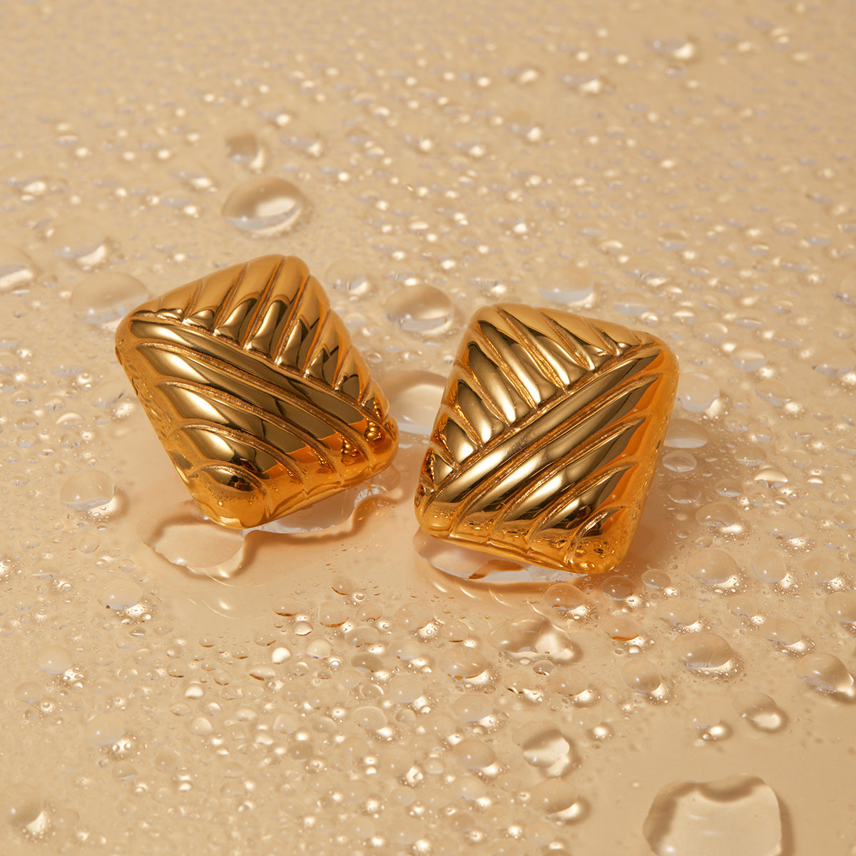 Sculptural textured earrings, side angle view