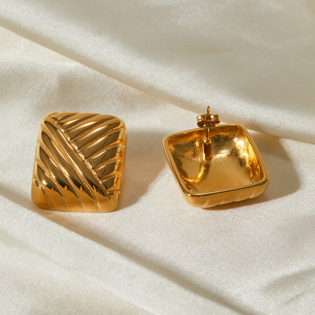 Statement gold drop earrings styled – Vessaly