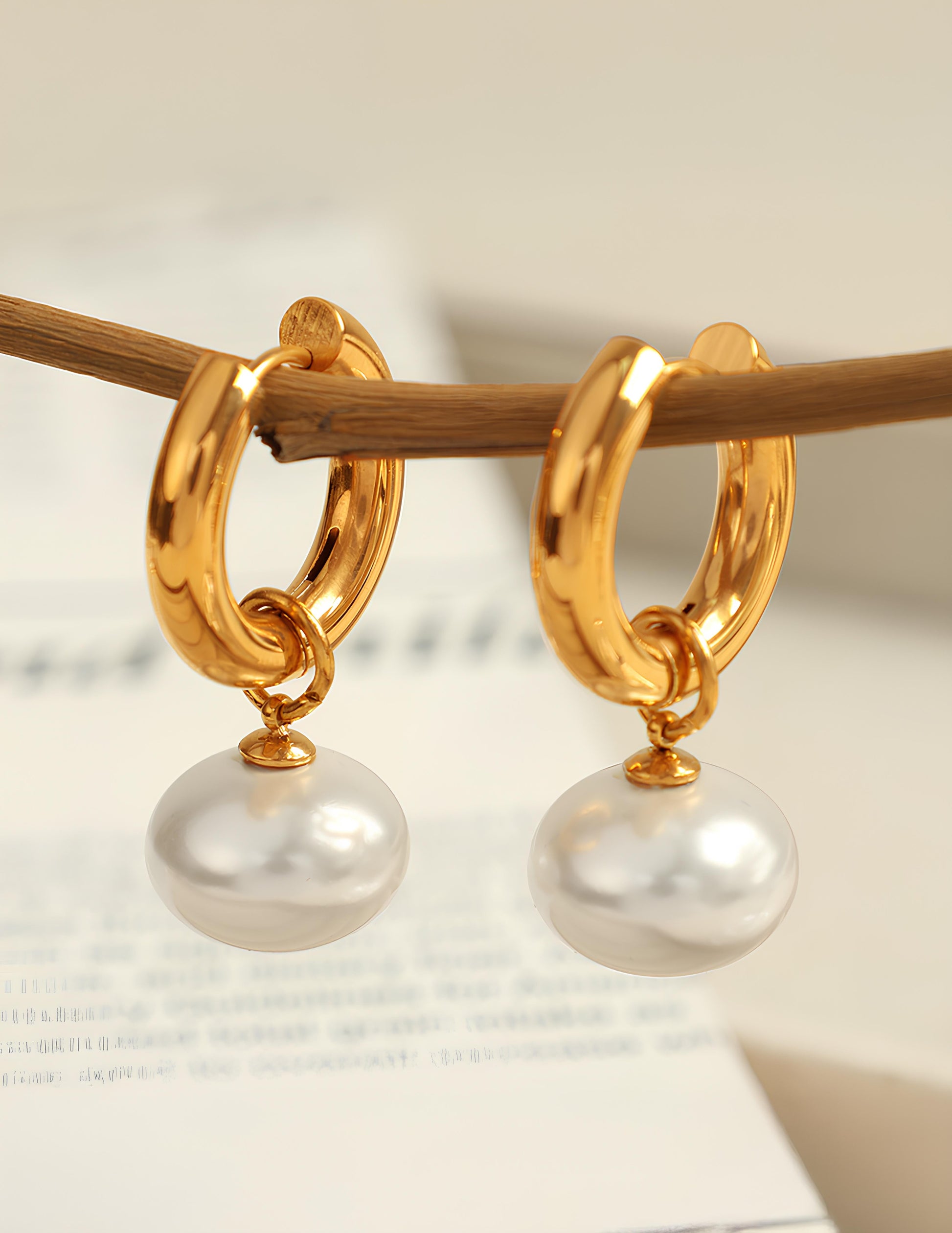 Gold opaline drop earrings, refined finish