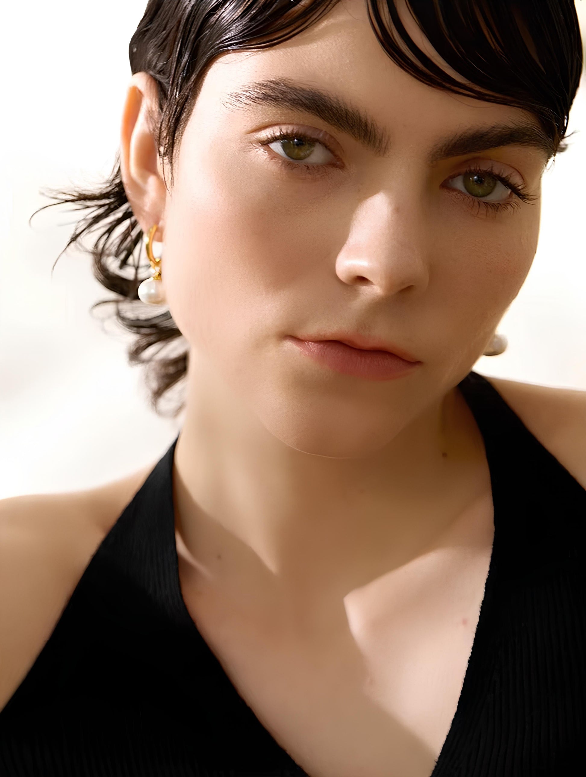 Opaline Drop Earrings pearl drop styled on model ear – Ravyena