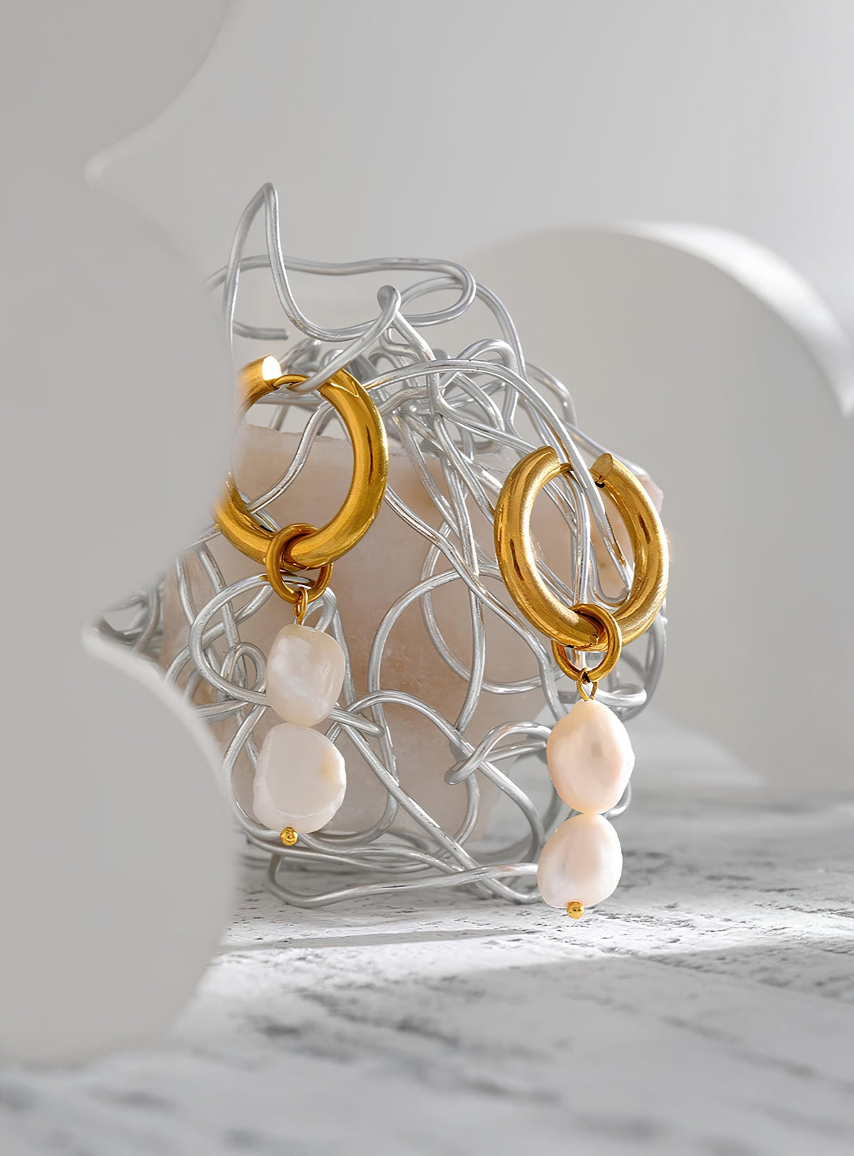 Tears of the Sea earrings – overhead flat lay