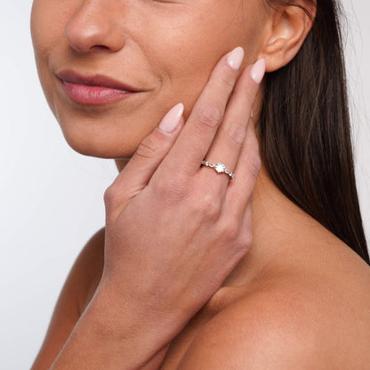 Nicole ring on neutral background, polished finish