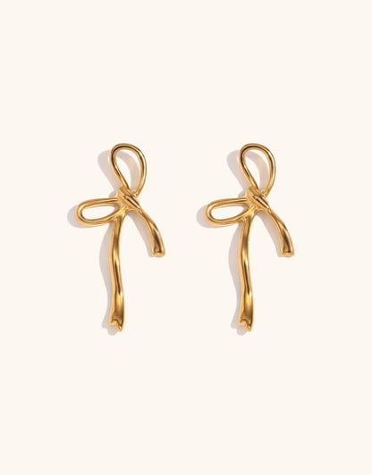Wandering Bow earrings – flat lay presentation