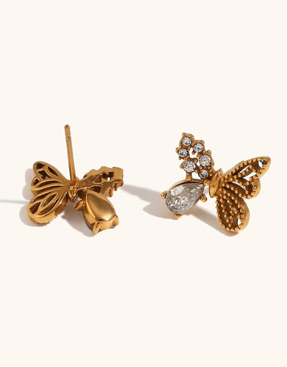 Dainty gold butterfly earrings side view – Vessaly