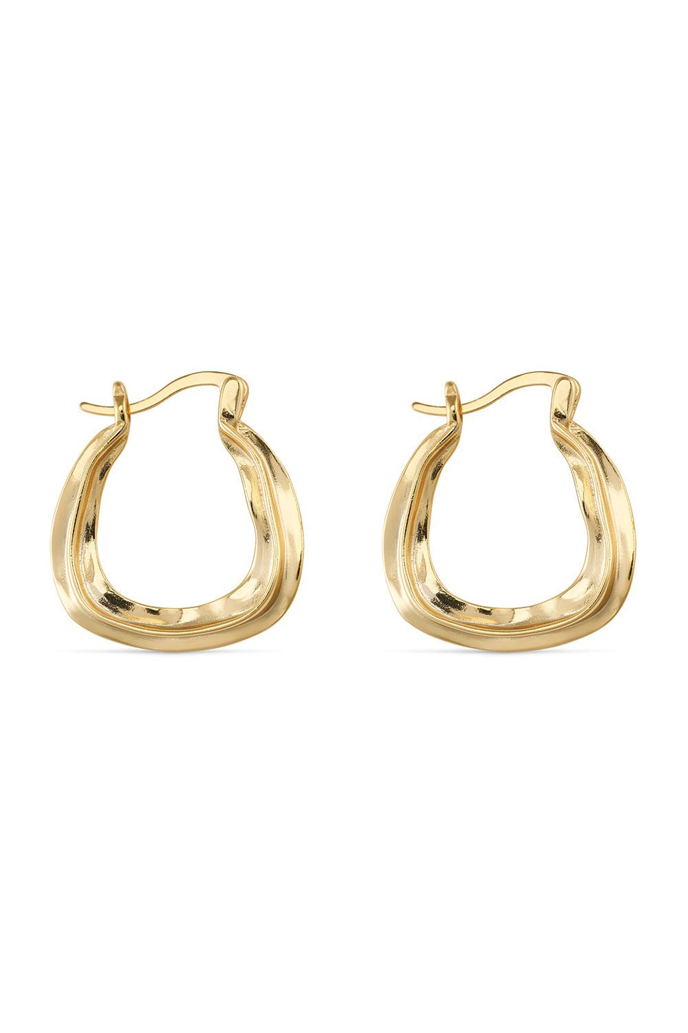 Chunky oval gold hoop earrings by Ravyena