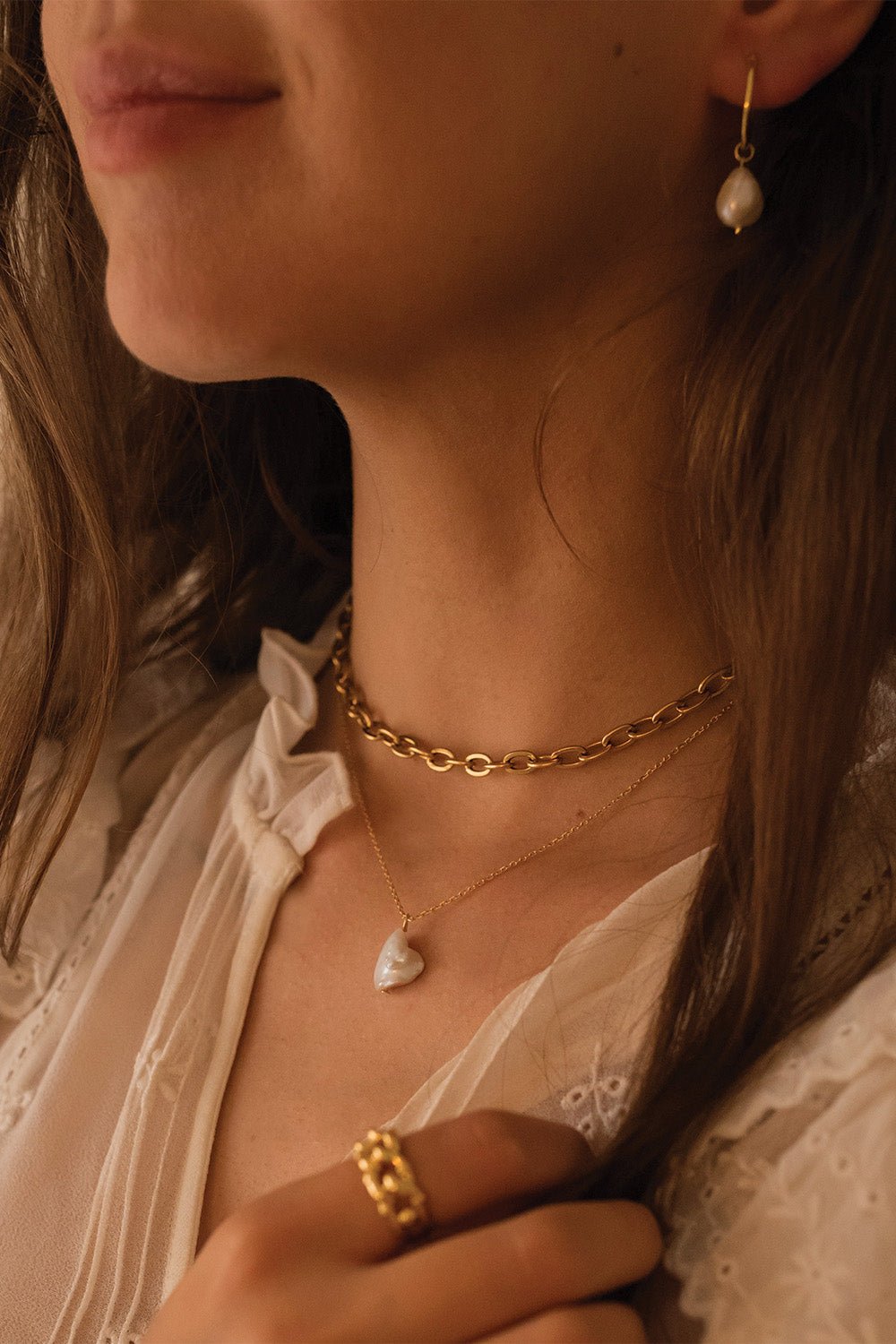 Freshwater pearl hoop earrings worn on the ear – Vessaly