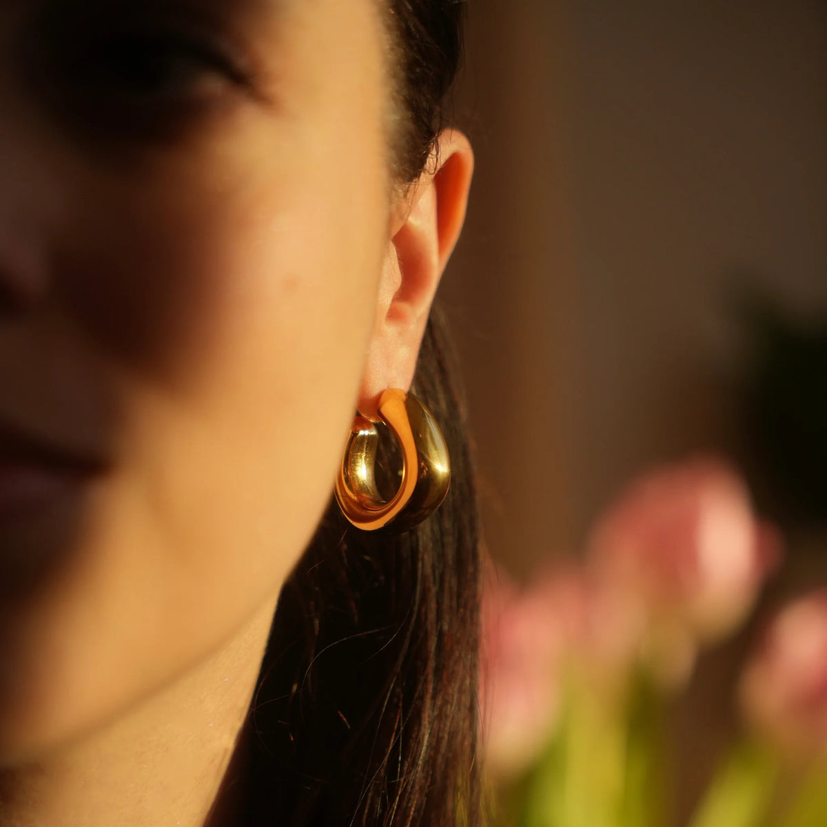 Vessaly chunky square earrings styled on model