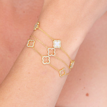 Gold vermeil bracelet with four mother-of-pearl and sapphire clovers