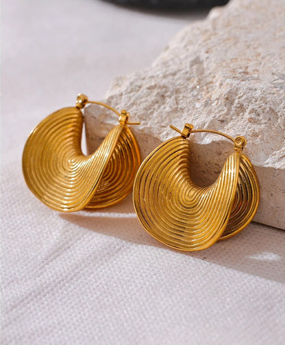 Spiral flow drop earrings, refined modern design