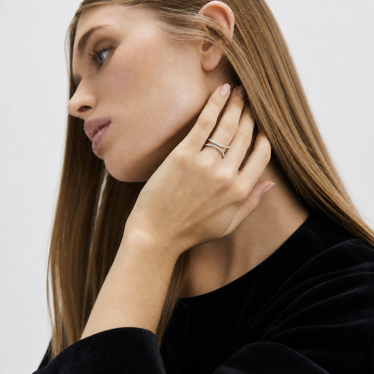 Crystal Flare Statement Ring Platinum worn by model profile view