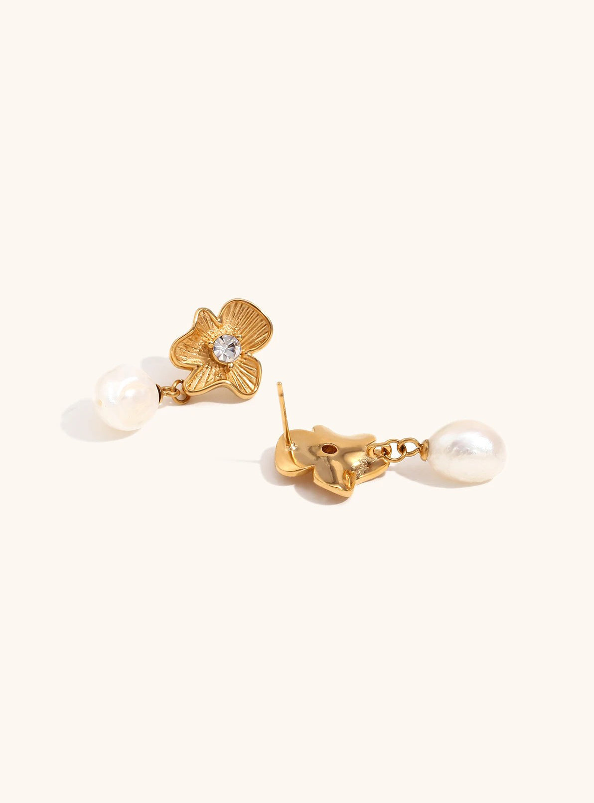 Magnolia drops earrings, side angle view