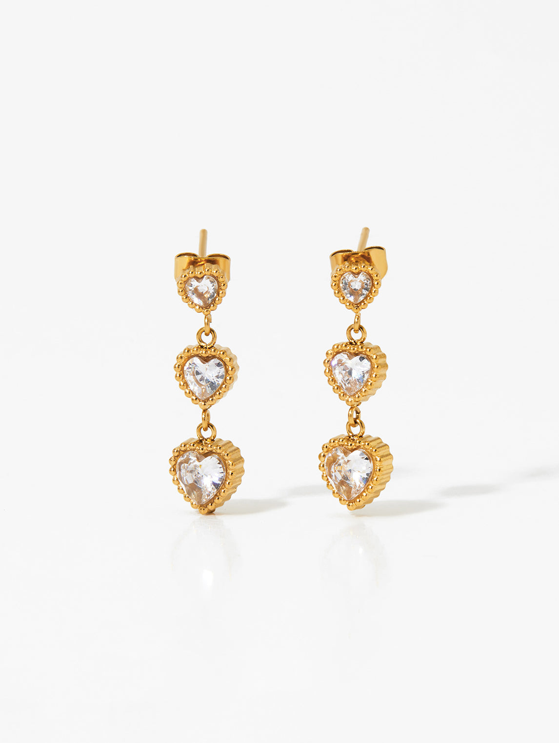 Trinity of Hearts gold drop earrings by Ravyena