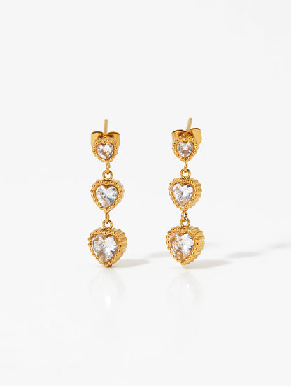 Trinity of Hearts gold drop earrings by Ravyena