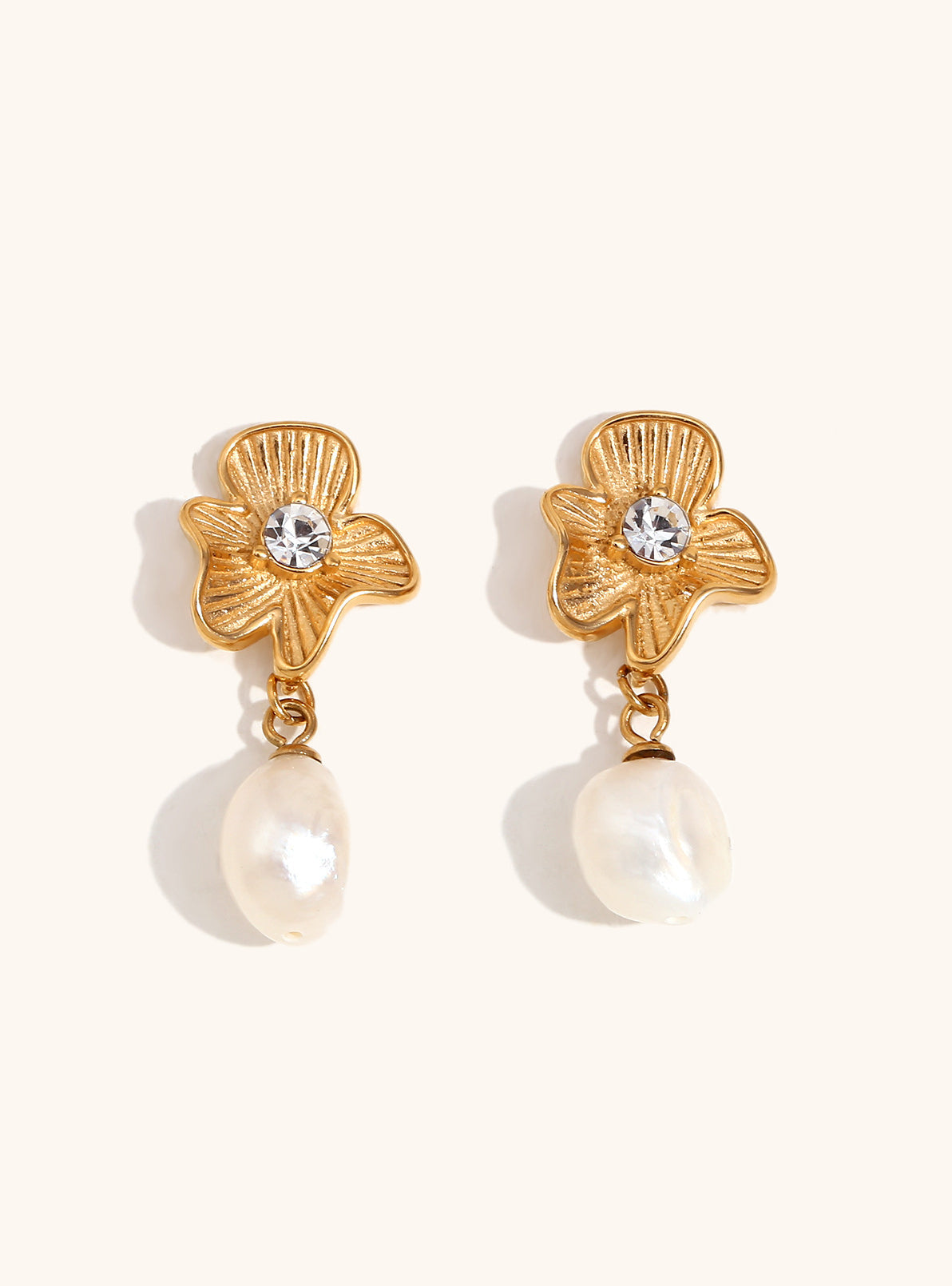 The magnolia drops earrings in 18K gold finish