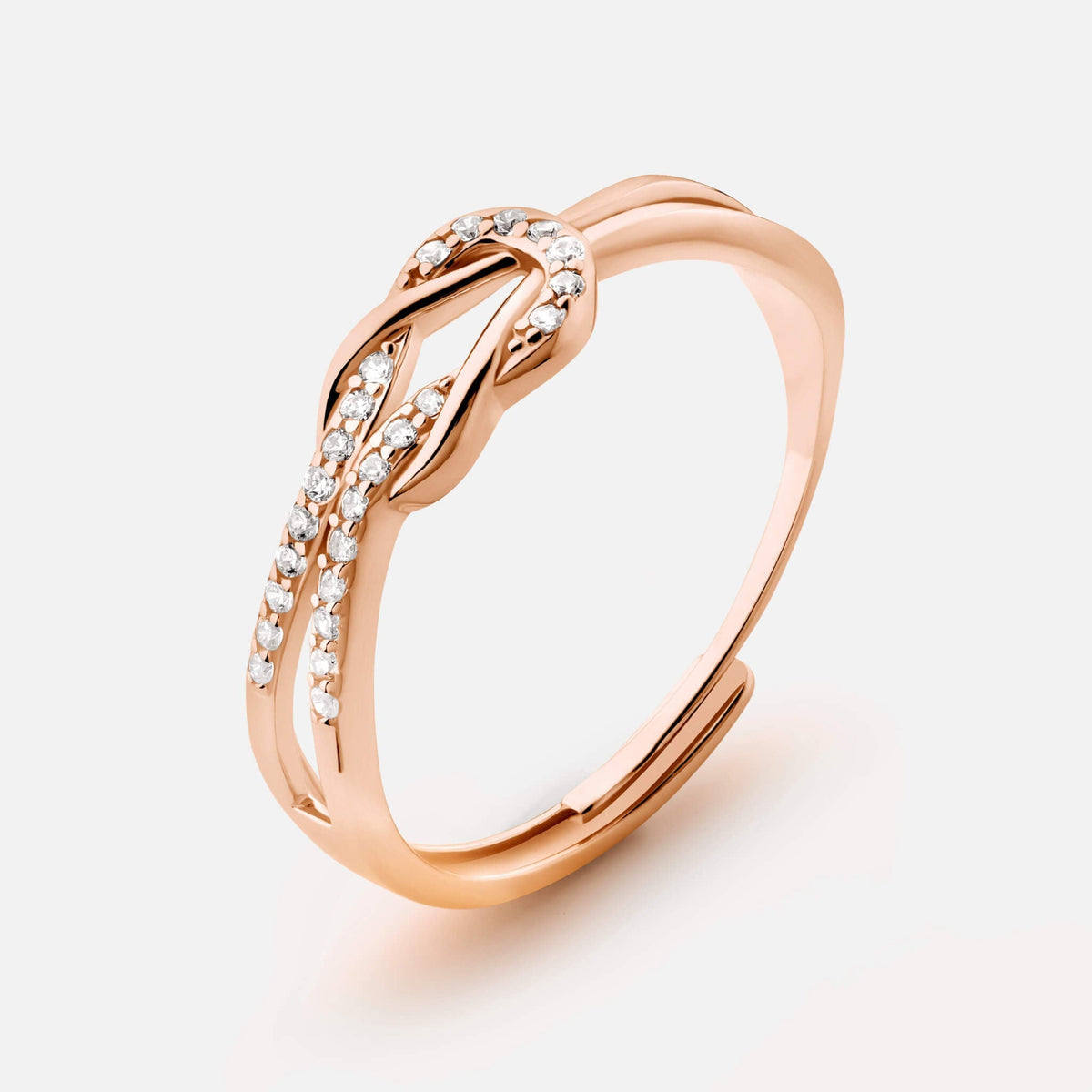 Knot ring on neutral background, refined finish