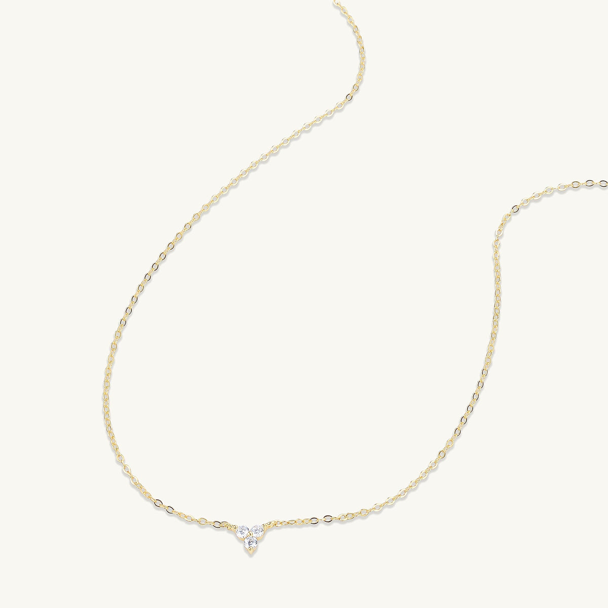 Lotus pendant necklace styled with an outfit – Vessaly