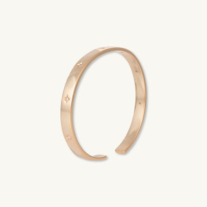 Gold bangle with star detail, alternative styling