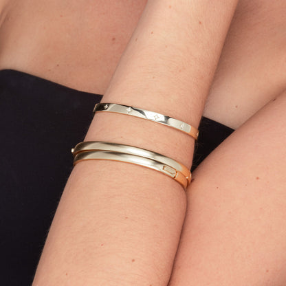 Gold north star bangle, lifestyle styling